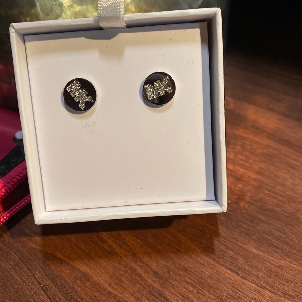 Micheal kors silver earring  light weight .